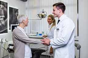 Woman meeting a dentist