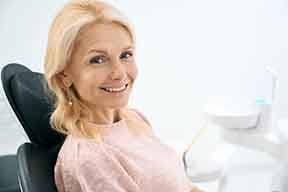 Woman smiling in the dental chair