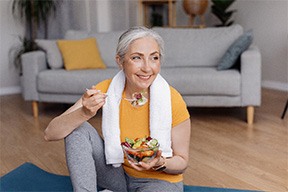 Dentures patient in Arlington eating healthy